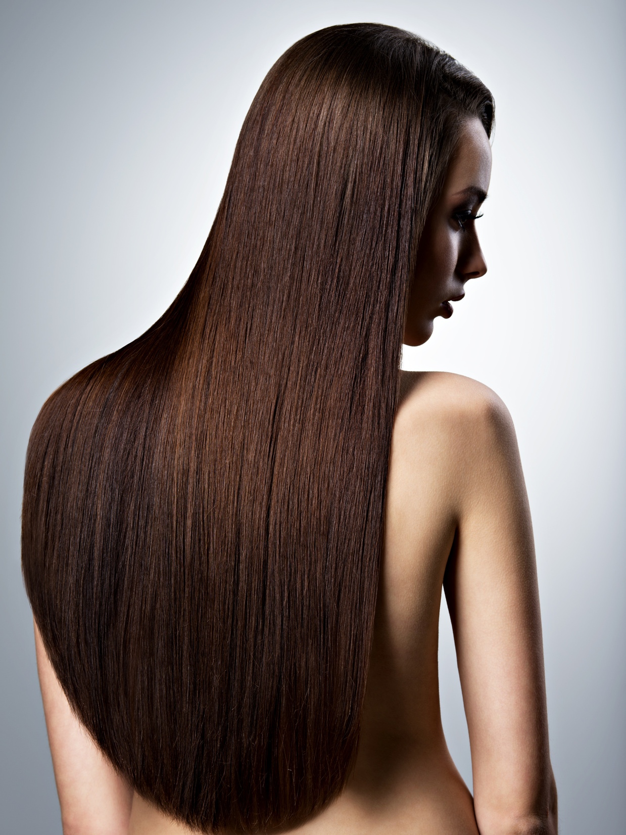 Portrait of Beautiful Woman with Long Straight Brown Hair